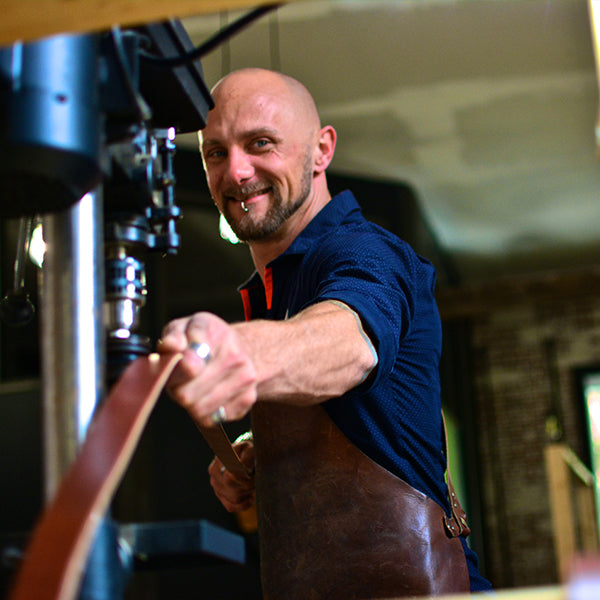 Makeing a Leather Belt -burnishing the leather with a smile