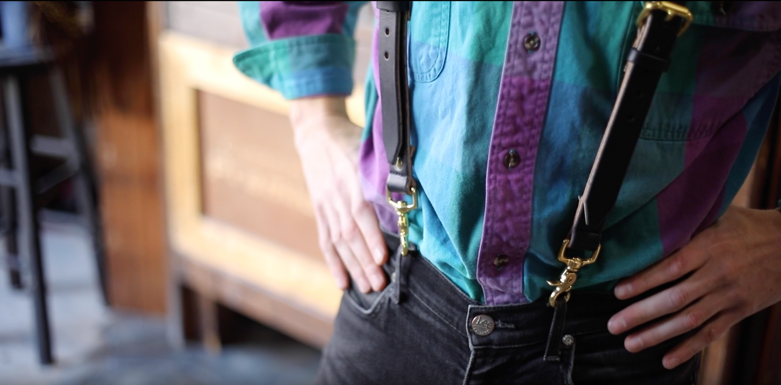 Solid Leather custom leather suspenders on a body in a workshop 